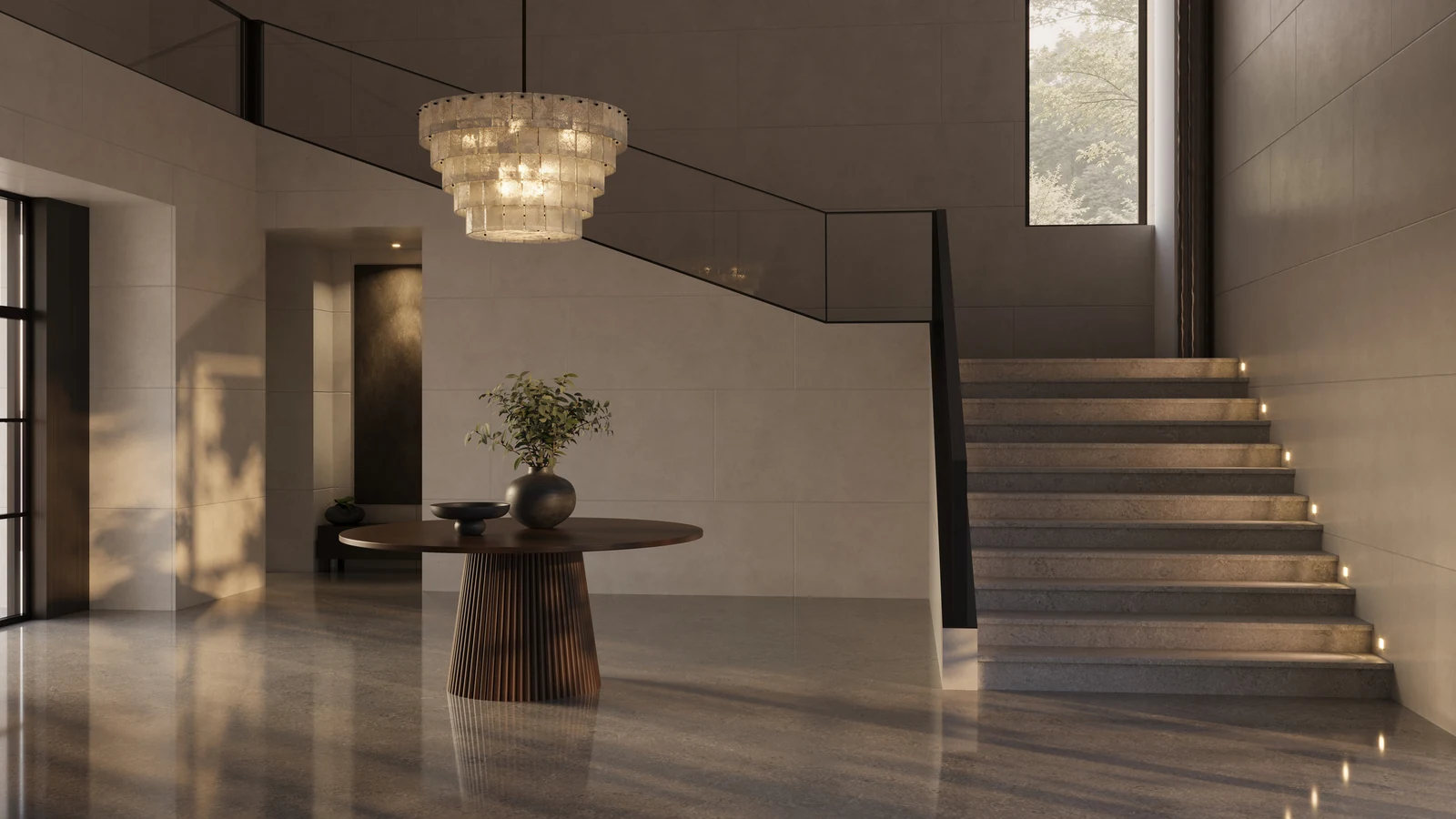 Bella Figura Collection — Paizzi CL ceiling light above a foyer with a console table and open staircase