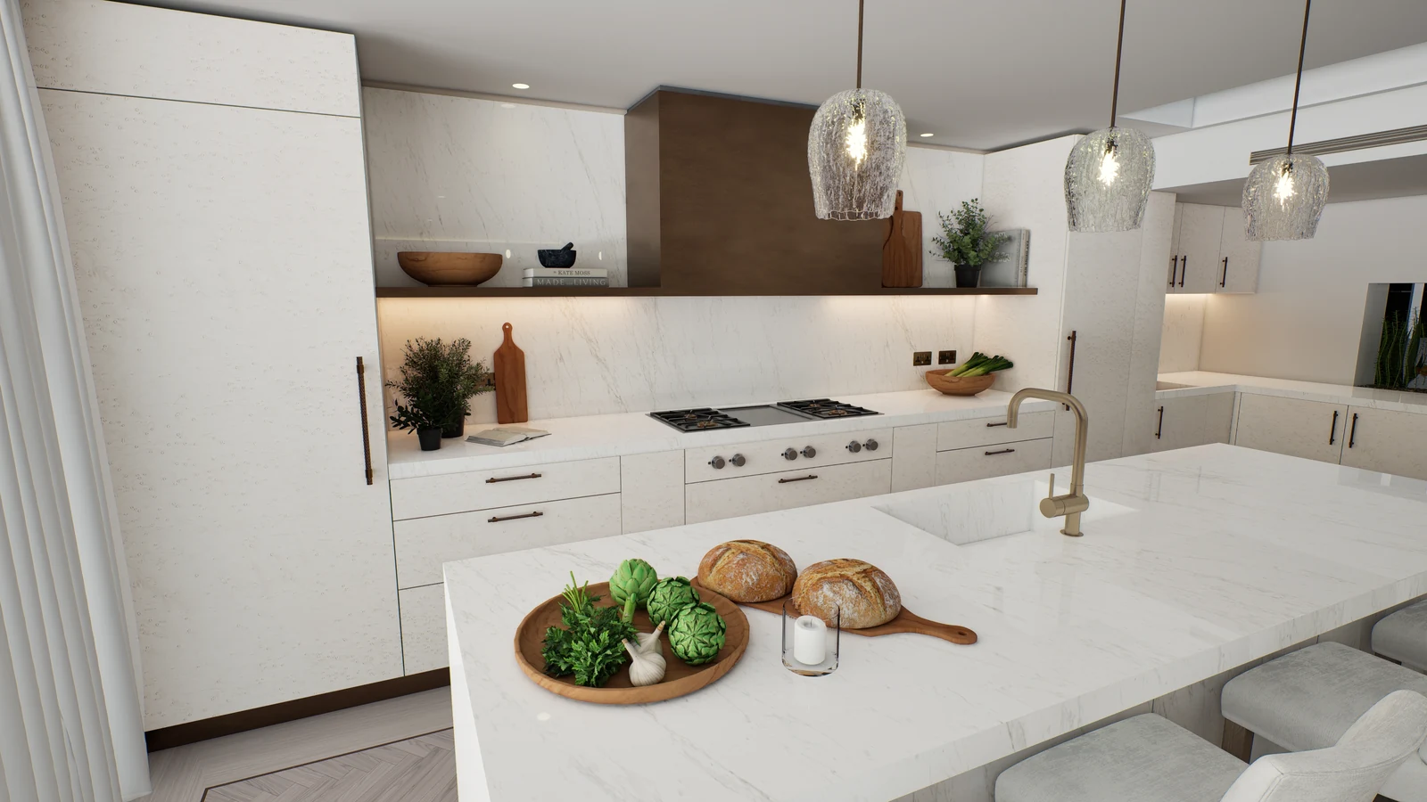 Richmond Residence — Close view of a white kitchen island with a brass tap and a bowl of fruit